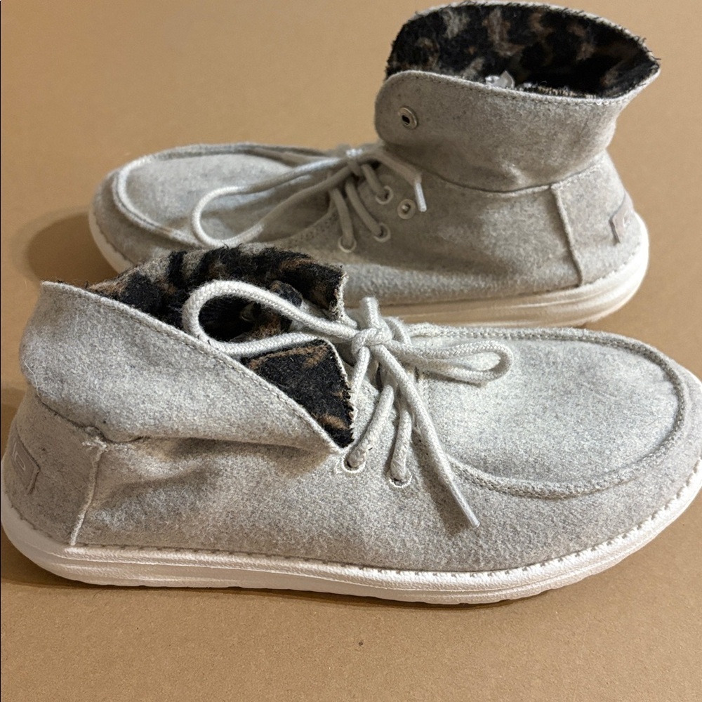 Hey Dude shoes with cheetah print inner lining
